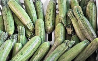 Detail of courgettes or zucchini vegetable food - useful as a ba photo