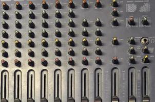 Detail of a soundboard mixer electronic device photo