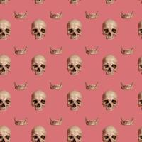 Skull with jaw on a pink seamless pattern. photo