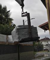 loading or unloading of stone tiles photo