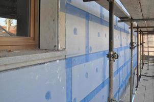 Thermal Insulation of an external wall with insulation boards in photo