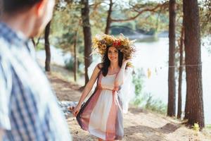 portrait girl with a wreath on head photo