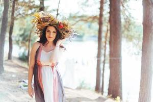 portrait girl with a wreath on head photo