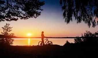 Woman on bicycle in the west photo