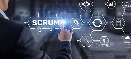 SCRUM. Hand presses the inscription scrum on a virtual panel. Agile development methodology
