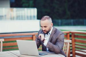 business man with a laptop photo