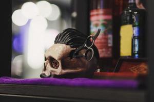 skull with scissors in a barbershop. photo