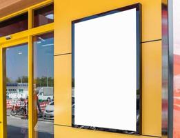 Mockup image of Blank billboard white screen posters and led outside storefront for advertising photo