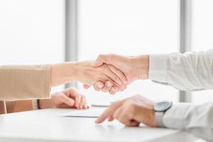 Senior man and woman handshake after meeting, Success teamwork concepts photo