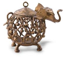 Indian elephant with bells metal candlestick. photo