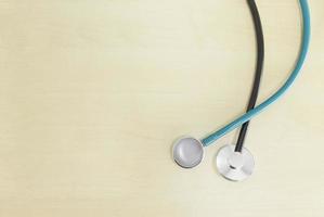 A close up of the device that monitors the heartbeat on a flat wooden floor photo