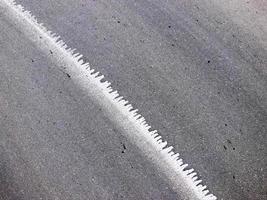 White line on asphalt road. photo