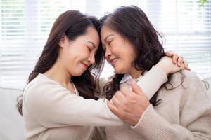 Image of Asian mother and daughter at home photo