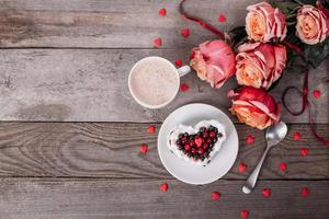 Heart shaped cake decorated with red currant photo