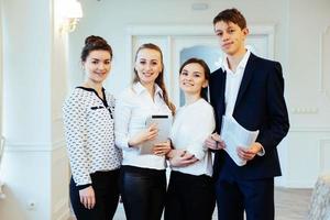 group of students looking happy and smiling photo