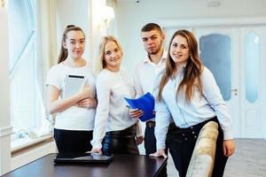 group of students looking happy and smiling photo