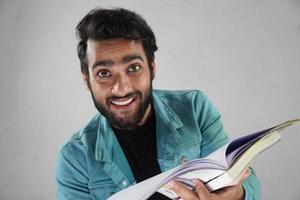 a man with book white background photo