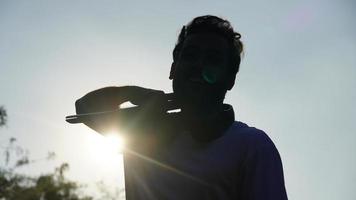 indian young man with laptop photo