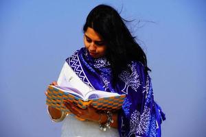 Happy smiling student girl with at outdoor shoot photo