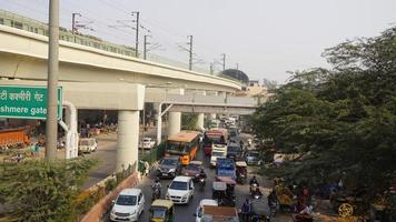 NEW DELHI - INDIA - 11 NOVEMBER 2020. Traffic jam on the polluted streets of New Delhi, India. Delhi has the highest number of motor vehicles and the traffic congestion is limited in few areas. photo