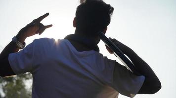 indian young man with laptop photo