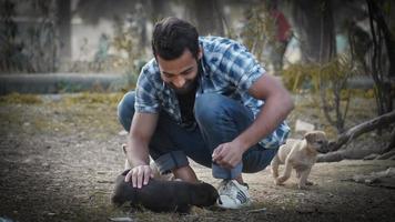 Young man with his dog photo