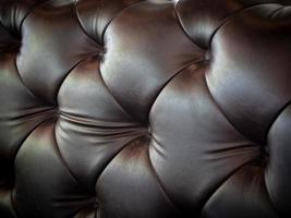 brown  leather texture with buttons for pattern and background. - Image photo