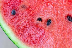 Red watermelon slice closeup fresh fruit photo