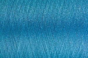 Closed up of blue color thread texture background photo