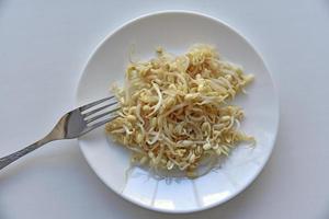 Sprouted beans on a white plate salad photo