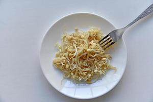 Sprouted beans on a white plate salad photo