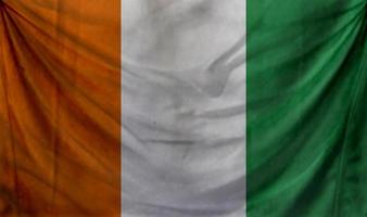 Cote d Ivoire flag waving. Background for patriotic and national design photo