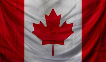 ondear la bandera de canadá. antecedentes para el diseño patriótico y nacional foto