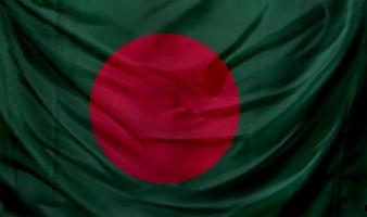 bandera de bangladesh ondeando. antecedentes para el diseño patriótico y nacional foto