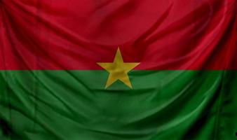 Burkina Faso flag waving. Background for patriotic and national design photo