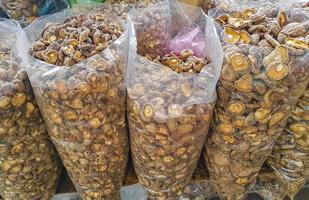 Dried packed mushrooms market Thai food China Town Bangkok Thailand. photo