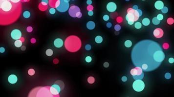 partículas de burbujas de colores cayendo para la pantalla video