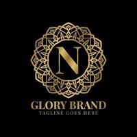 diseño de logotipo de vector de lujo de color dorado vintage de mandala de gloria de letra n