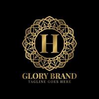 letter H glory mandala vintage golden color luxury vector logo design