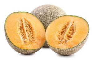 Sliced cantaloupe - Close up, clipping path, cut out. Beautiful tasty fresh ripe rock cantaloup melon fruit with seeds isolated on white background. photo