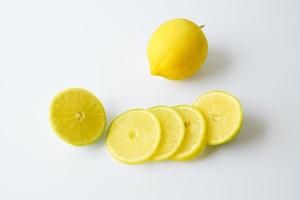 Lemon sliced isolated on white background. photo