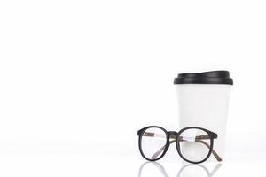 White Coffee Cup and glasses Isolated on white background photo