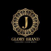 letter J glory mandala vintage golden color luxury vector logo design