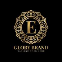 letter E glory mandala vintage golden color luxury vector logo design