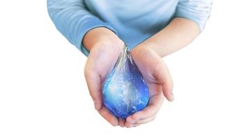 Hand hold water world drop  on white isolated background for ecology waste water concept. photo