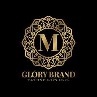 letra m gloria mandala vintage color dorado lujo vector logo diseño