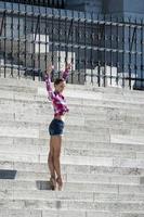 Budapest, Hungary, 2014. Ballerina Posing on the Steps of the Hungarian Parliament Building photo