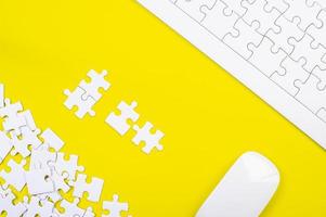 A jigsaw puzzle on a yellow background Business idea photo