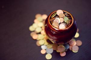 The concept of saving money predefined by saving coins for a growing business division. photo