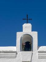 CASARES, ANDALUCIA, SPAIN, 2014. View of a cross in the cemetery in Casares Spain on May 5, 2014 photo